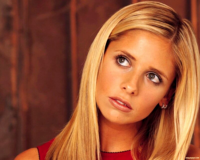 blonde woman in red top