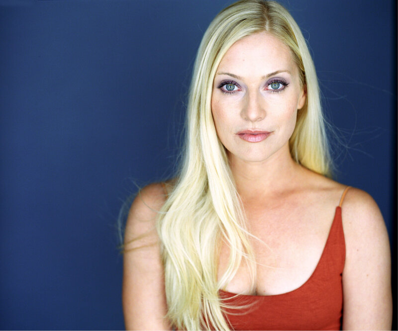 blonde woman in red top