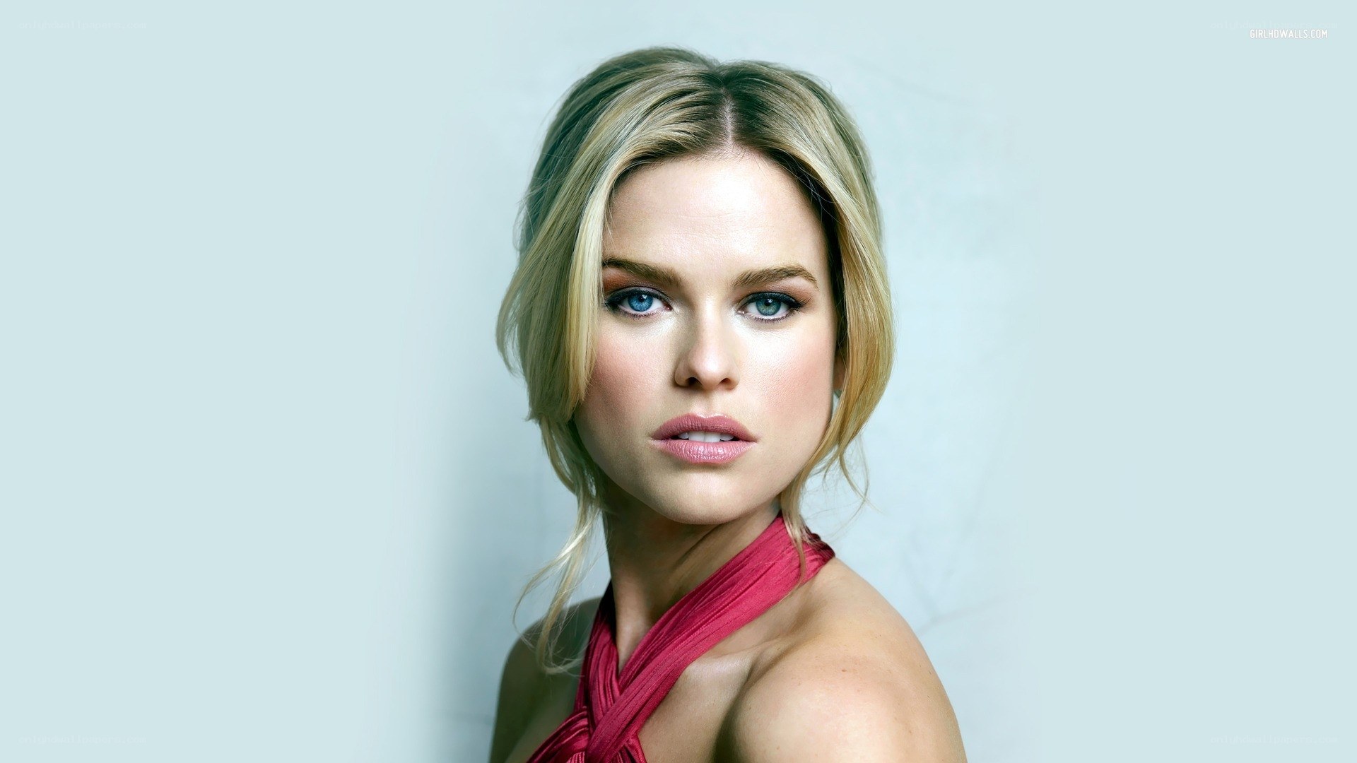 blonde woman in red top