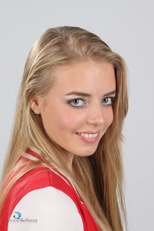 Blonde Woman in Red Vest — Neutral, Photograph