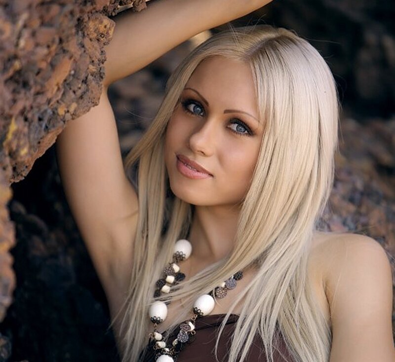 Blonde Woman in Rocks