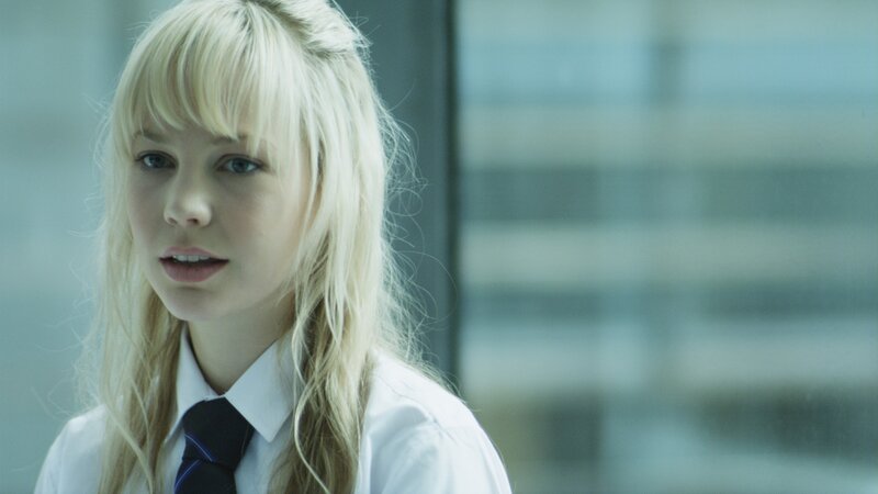 blonde woman in school uniform