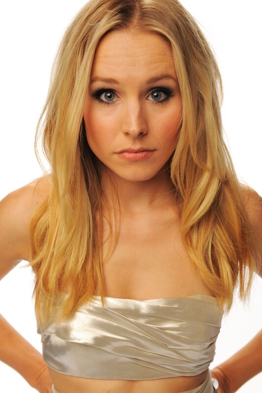blonde woman in silver top
