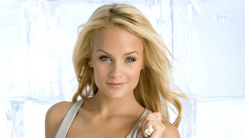 blonde woman in silver top