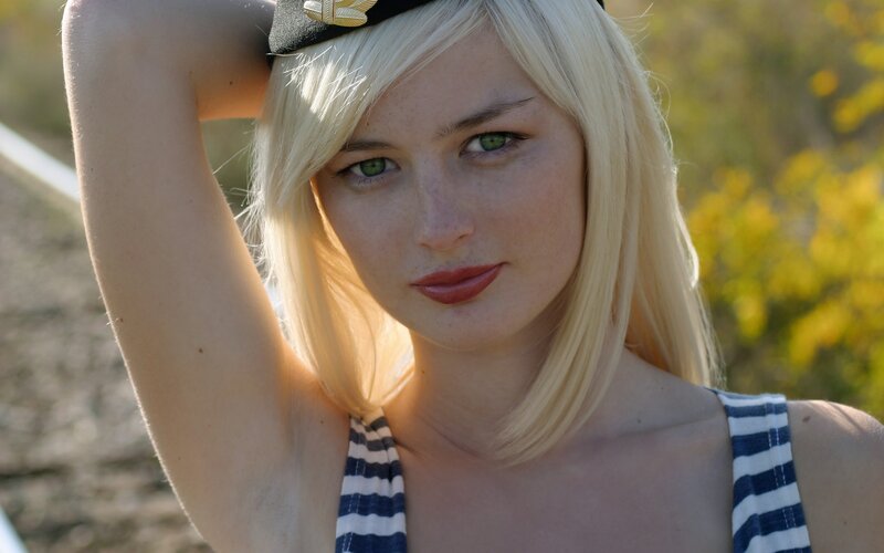 blonde woman in striped top