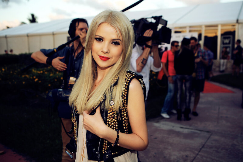 Blonde Woman in Studded Vest