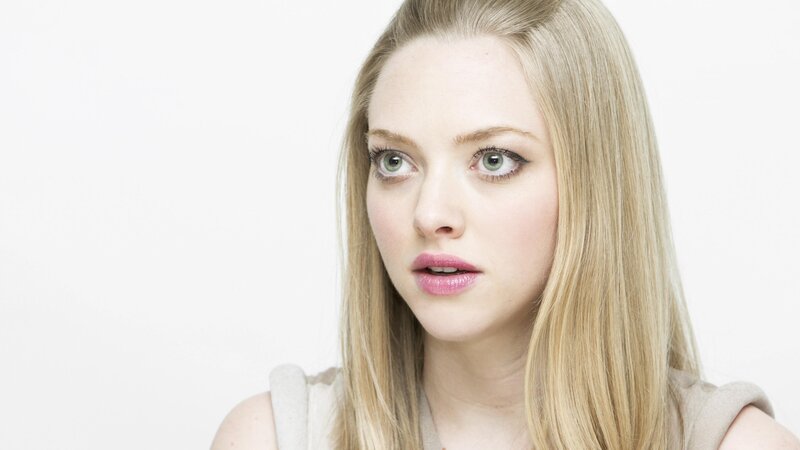 blonde woman in studio portrait