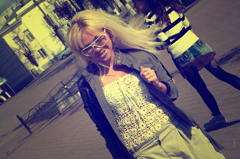 Blonde woman in sunglasses