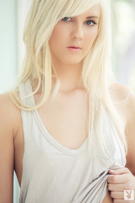 blonde woman in tank top
