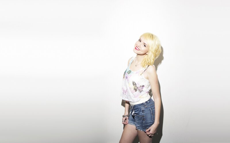 Blonde Woman in Tank Top — White, Confident, Photograph