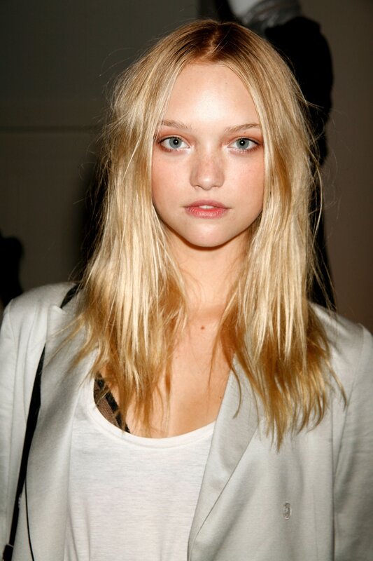 blonde woman in white blazer