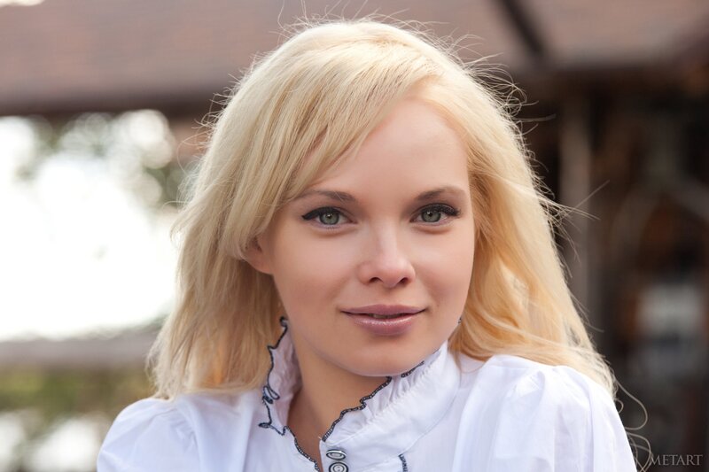 blonde woman in white blouse