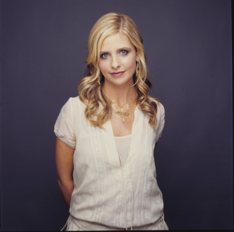 Blonde woman in white blouse