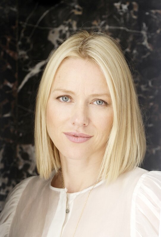 blonde woman in white blouse