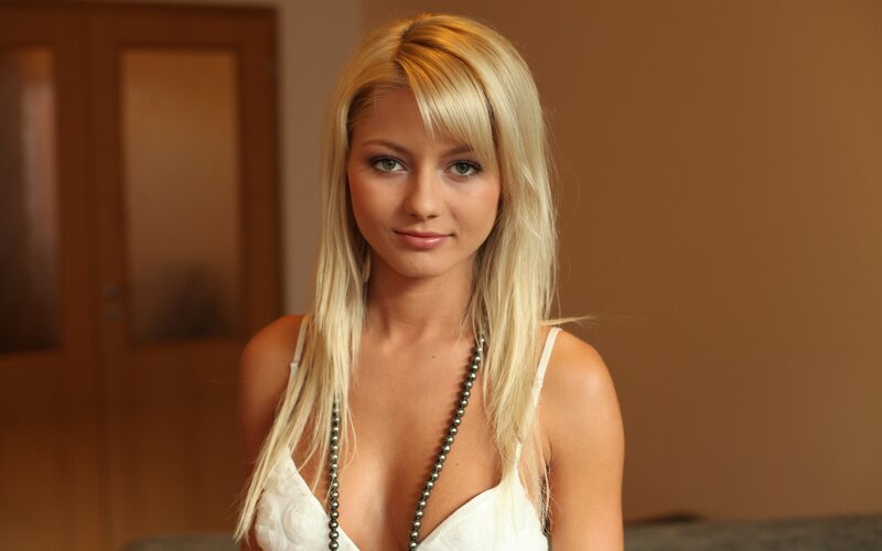 Blonde Woman in White Dress — Neutral, Photograph, Necklace, Door