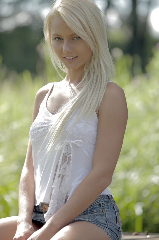 Blonde woman in white top