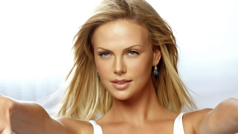 blonde woman in white top