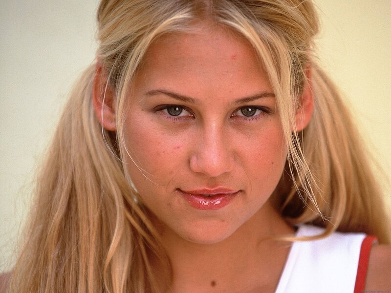 blonde woman in white top