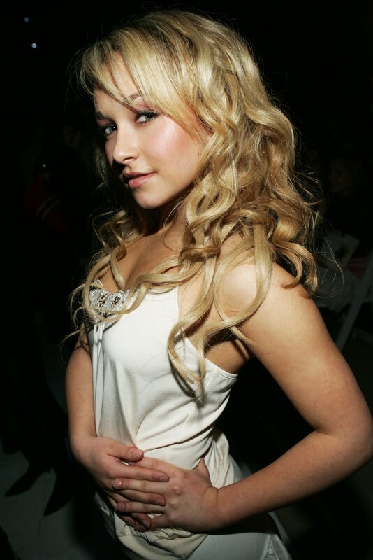 Blonde woman in white top