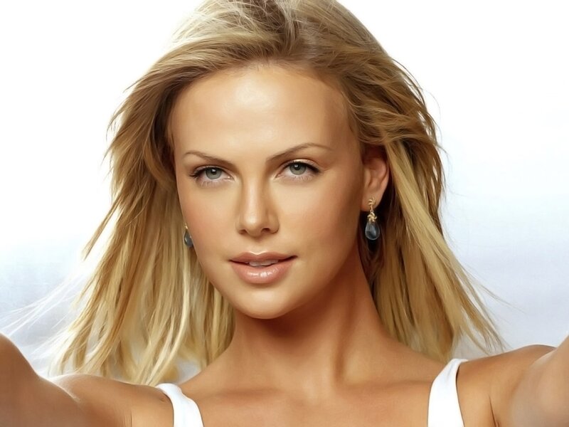 blonde woman in white top