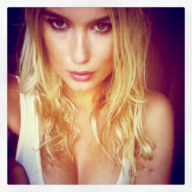 blonde woman in white top
