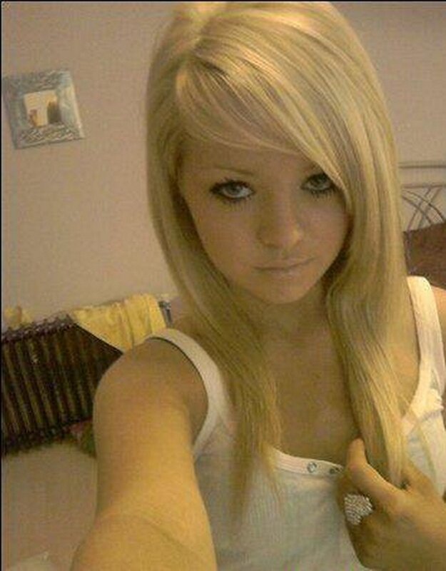 blonde woman in white top