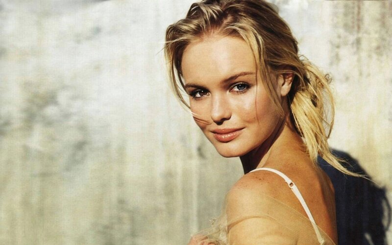 blonde woman in white top