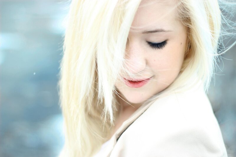 Blonde Woman in Wind — White, Calm