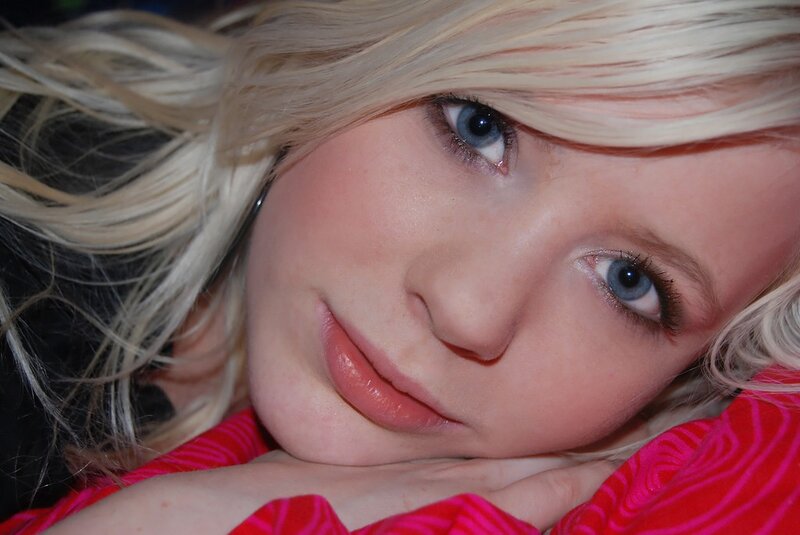 Blonde Woman Lying Down — Calm, Photograph, Red Shirt