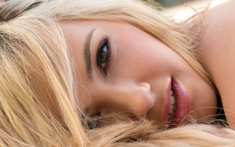 Blonde Woman Lying Down — Relaxed, Afternoon