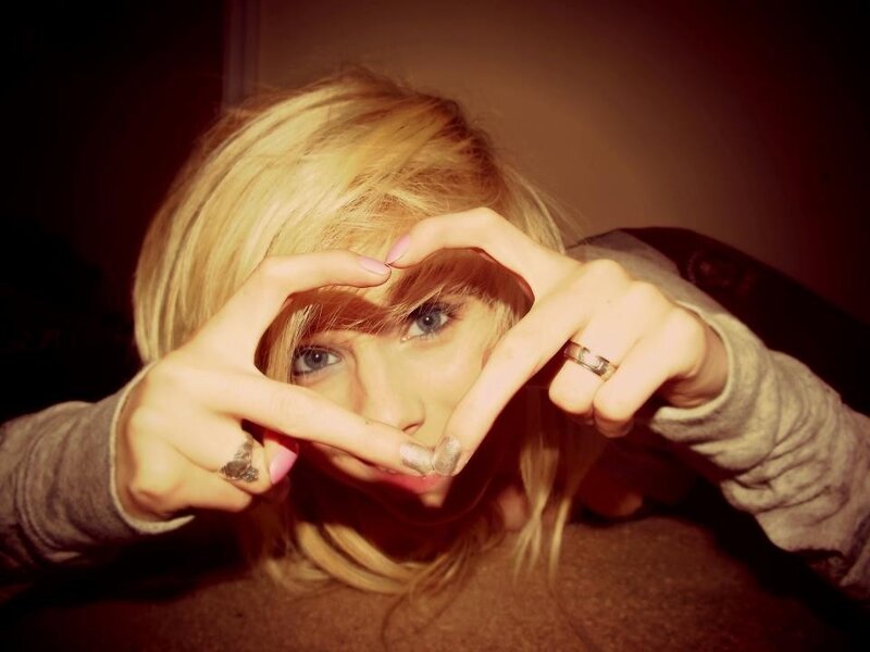 Blonde Woman Making Heart