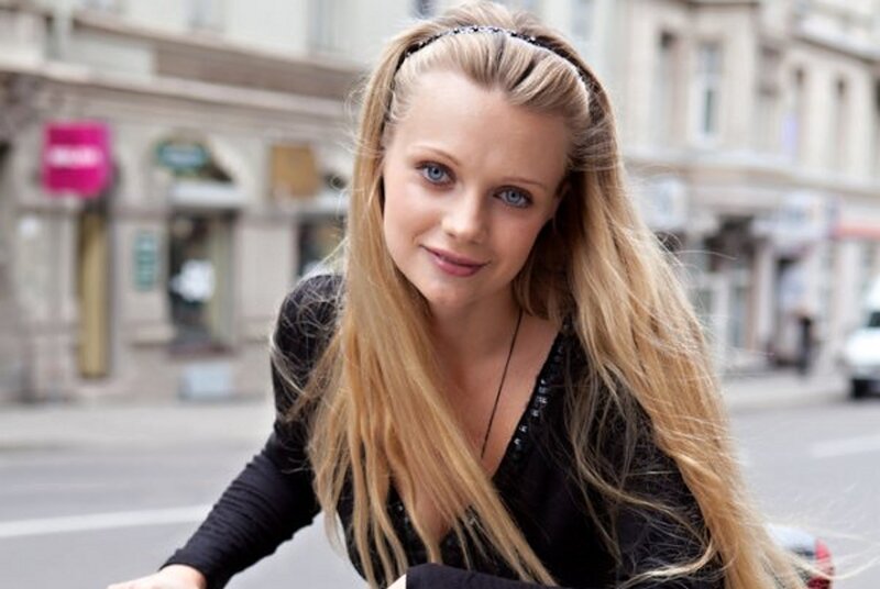 Blonde Woman on Bicycle