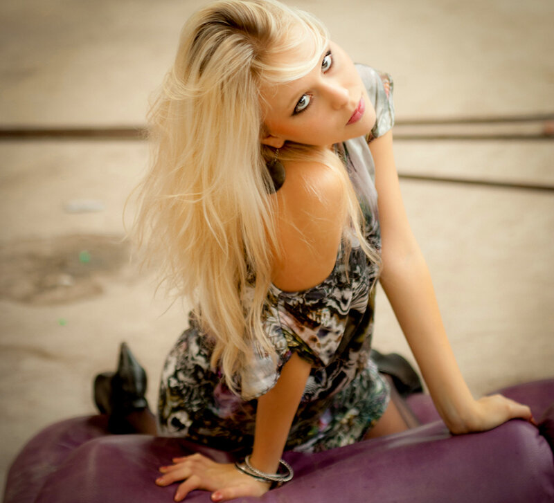 Blonde Woman on Purple Beanbag