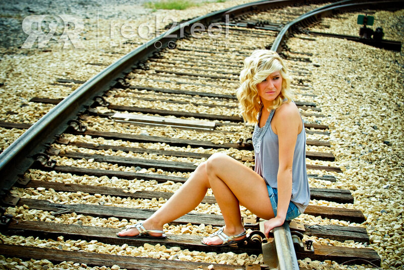 Blonde Woman on Train Tracks — Gray