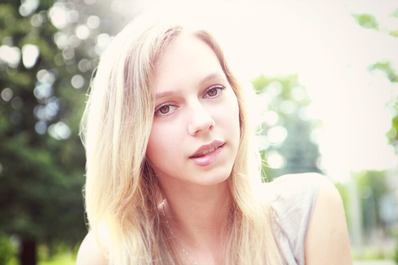 Blonde Woman Outdoors — White, Serene