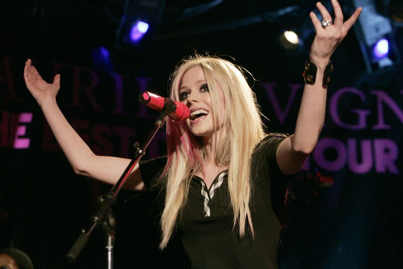 Blonde Woman Singing — Black, Energetic, Night, Photograph, Microphone, Stage Lights