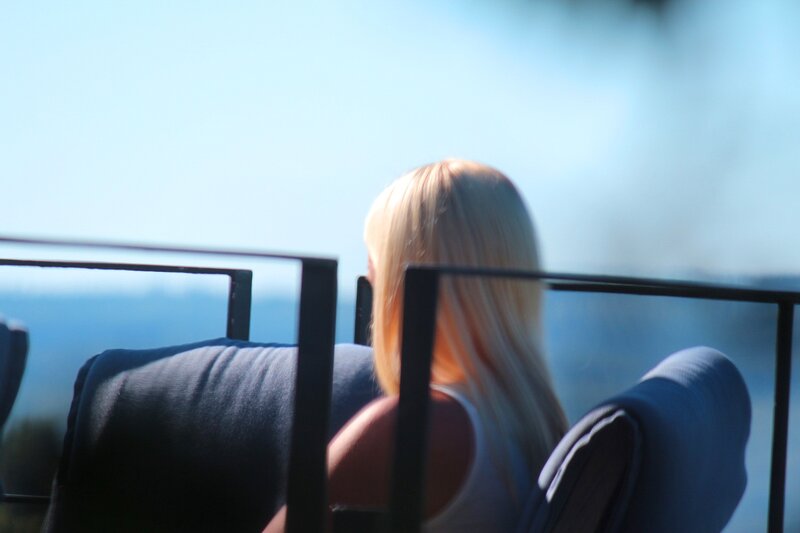 Blonde Woman Sitting — Blue, Serene