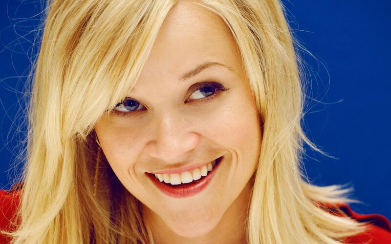 blonde woman smiling