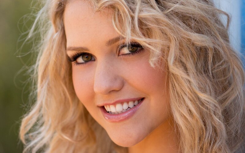 blonde woman smiling