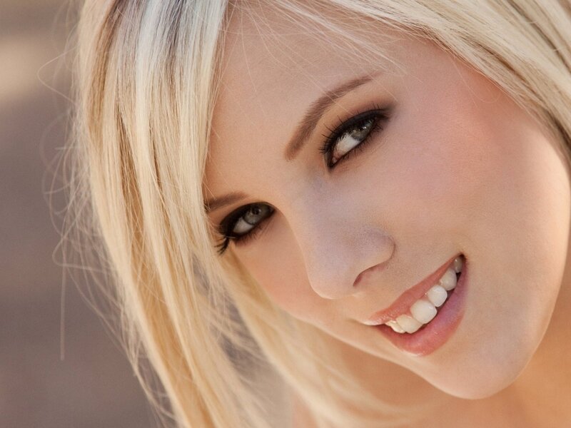 blonde woman smiling