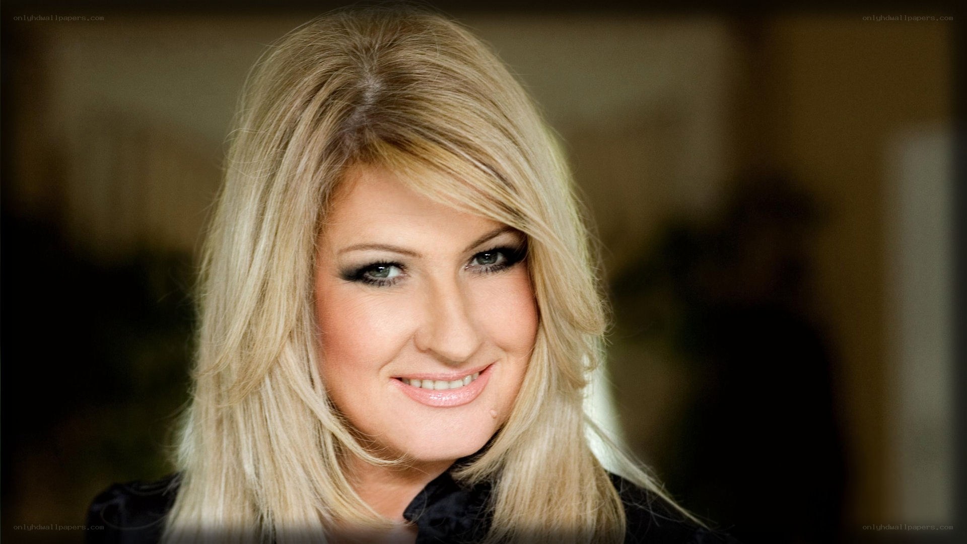 blonde woman smiling