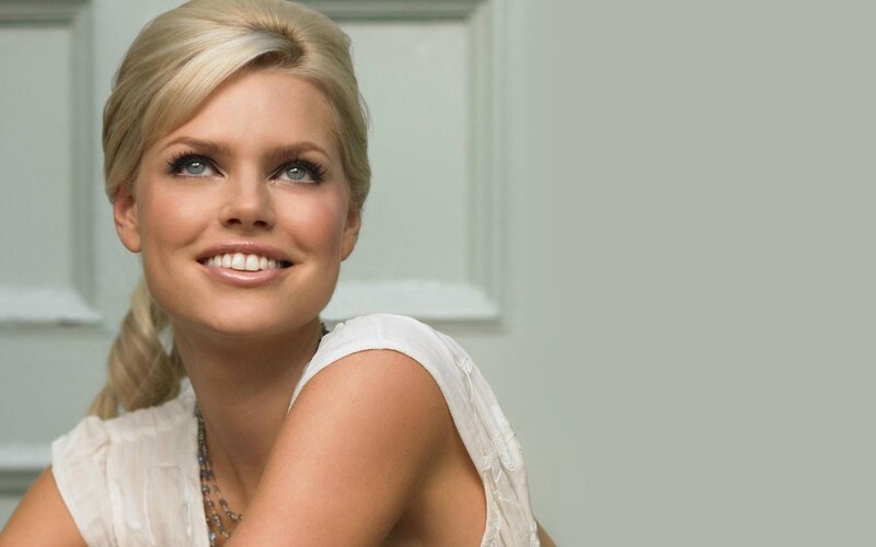 blonde woman smiling