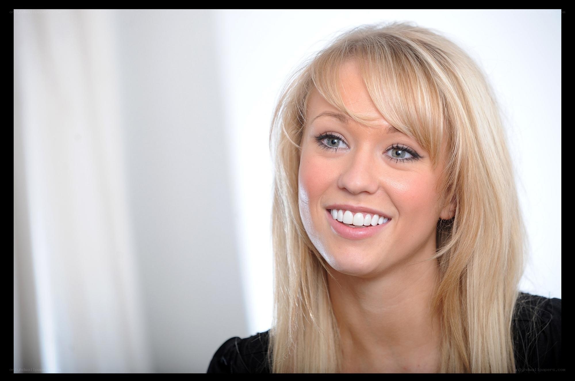 blonde woman smiling