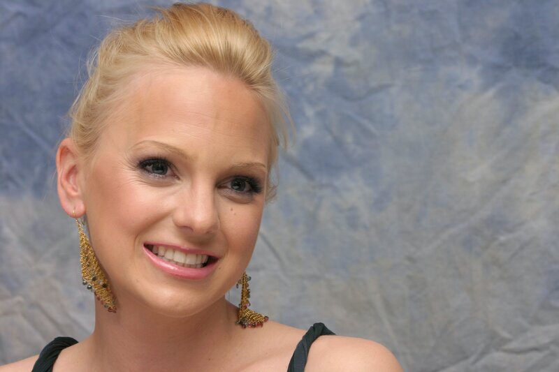 blonde woman smiling at camera