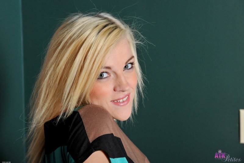 blonde woman smiling at camera