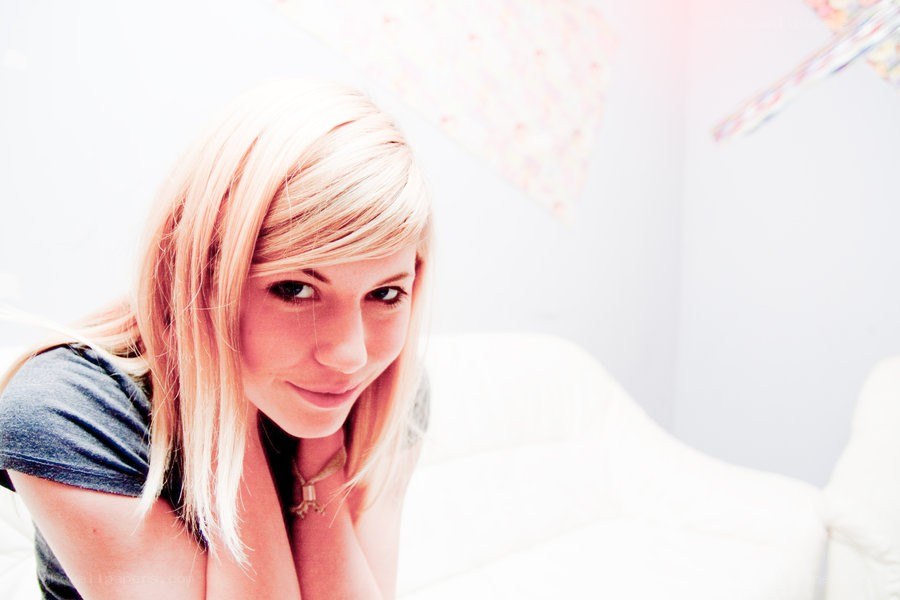 blonde woman smiling at camera