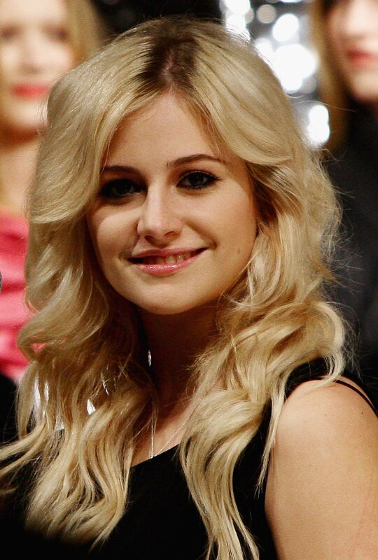 blonde woman smiling at event