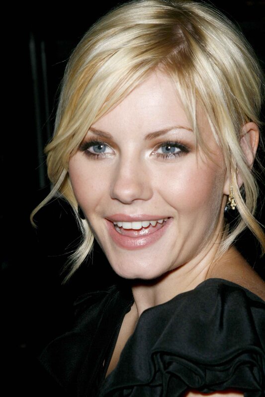 blonde woman smiling at event
