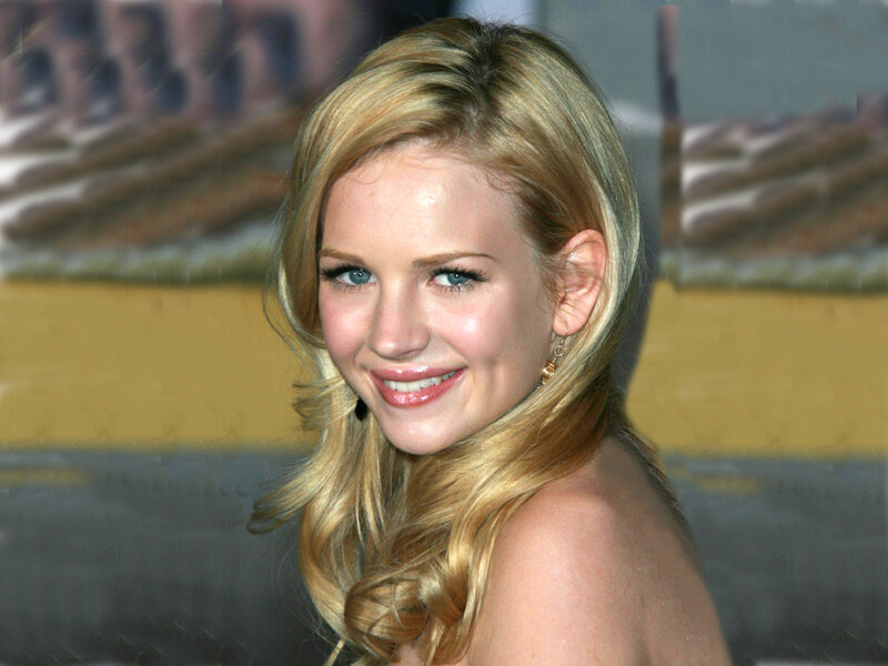 blonde woman smiling at event