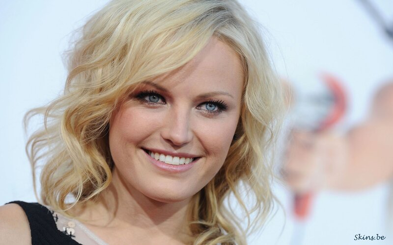 blonde woman smiling at event